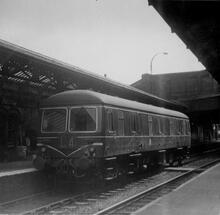  Cravens Parcels Van M55999 at Macclesfield Hibel Road (MCH @ 9m 37ch). 11 April 1959