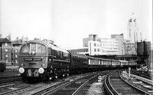 74001 as E5015 heading the Golden Arrow Pullman train away from Victoria c.1961. (Ref: 010723)