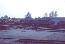 017147    Departmntal Staff and dormitory coach QPV DW150397 ex W2232W BTK  Very dark. Gloucester 27 April 1983