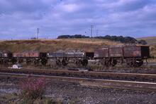 017077  BR wagons in siding - loaded wth ballast. Hellifield 5 September 1975