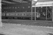 Class 310. Rugby station (LEC1 @ 82m 40ch). Northbound EMU at old platform 1. 8 August 1975 (Ref: 012032)