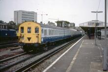 BR(S) EMU Class 414/3 2HAP unit 6100.  Woking 20 September 1983 (Ref: 017213)
