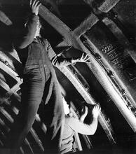 London Underground. Installing expanded metal for tunnel finishes. (Ref: 031173)