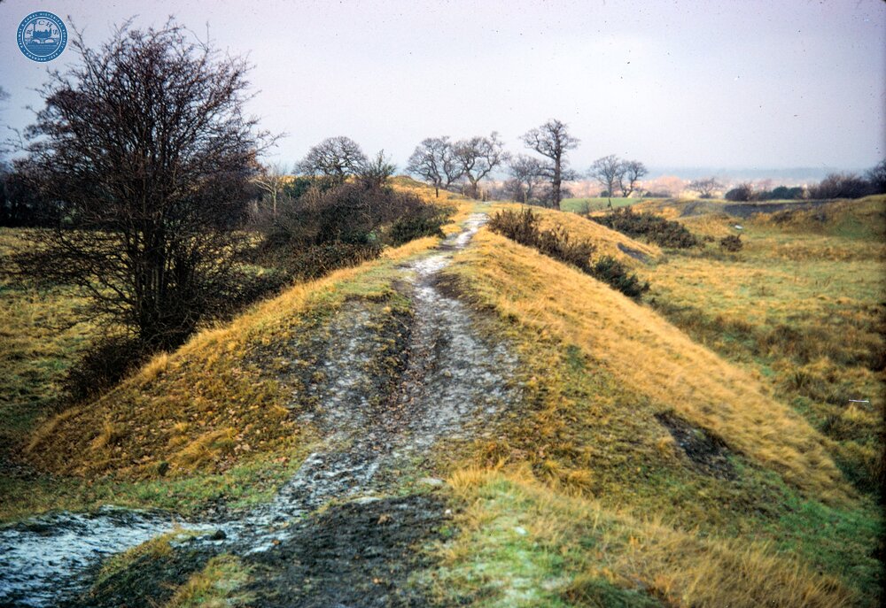 Adlington 'train road', looking north by the break in the embankment. 28 December 1969