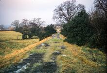Adlington 'train road', looking north from south of the break in the embankment. 28 December 1969