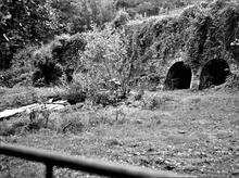 Llanfihangel Railway. Remains of lime kilns below Brecknock & Abergavenny Canal between Govilon and Llanfoist, looking towards Llanfoist. 19 October 1976 