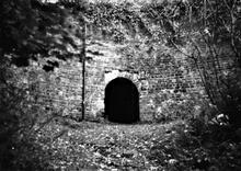 Brecknock and Abergavenny Canal. Llanfoist Parish Road bridge under canal. 25 October 1976.