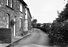 Llanfihangel Railway. Abergavenny, Springwells. Line of railway passing Junction Cottages (built by LNWR). June 1973