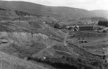 Penydarren Tramroad. Merthyr Tydfil. The line crosses the quarries at Pentrebach by Winches Row, and to the right of the chimney at Duffryn Pits. 1946 (10)