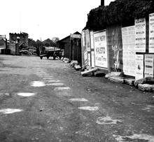 Stratford & Moreton Railway, Stratford-on-Avon.  Exit of tramroad from the canal basin on to Bridge Foot.  20 May 1932. (2)