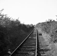 Stratford & Moreton Railway, Stretton-on-Fosse. View north from level crossing over the Fosse Way level crossing with later GWR track on old alignment. 23 August 1953 (54)