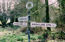 Newbury to Winchester line. Signpost to Burghclere station (ELR - NWT @ 6m 36ch). 16 March 2004
