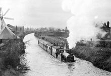 Creech St. Michael.(MNL1 @ 160m 25ch)  A second passenger train proceeding with caution through floodwater November 1894.(Ref: 031240)
