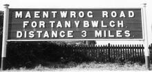 Maentwrog Road Station (LJT2 @ 19m 75ch). Name board 