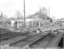 Bramley (BKE @ 46m 41ch) Crossing gates  closed for rail traffic  looking towards Basingstoke. (Ref:325215E  C8_7)