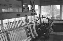 Bramley (BKE @ 46m 41ch) Interior of signal box - gate wheel and lever frame. (Ref: 325235E   C8_27)