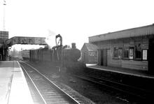  0-6-0 with Train in station   (325203E   C7_12)