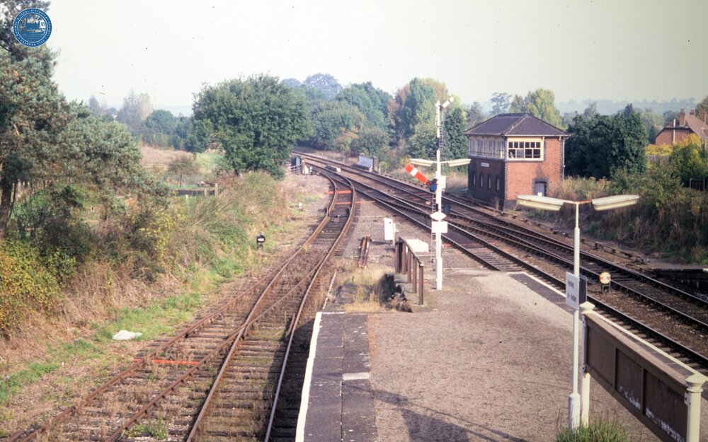 100997E