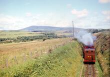 Isle of Man Railway. Near Ballasalla. No. 10 “G H Wood” & train from Port Erin. 22 July 1965