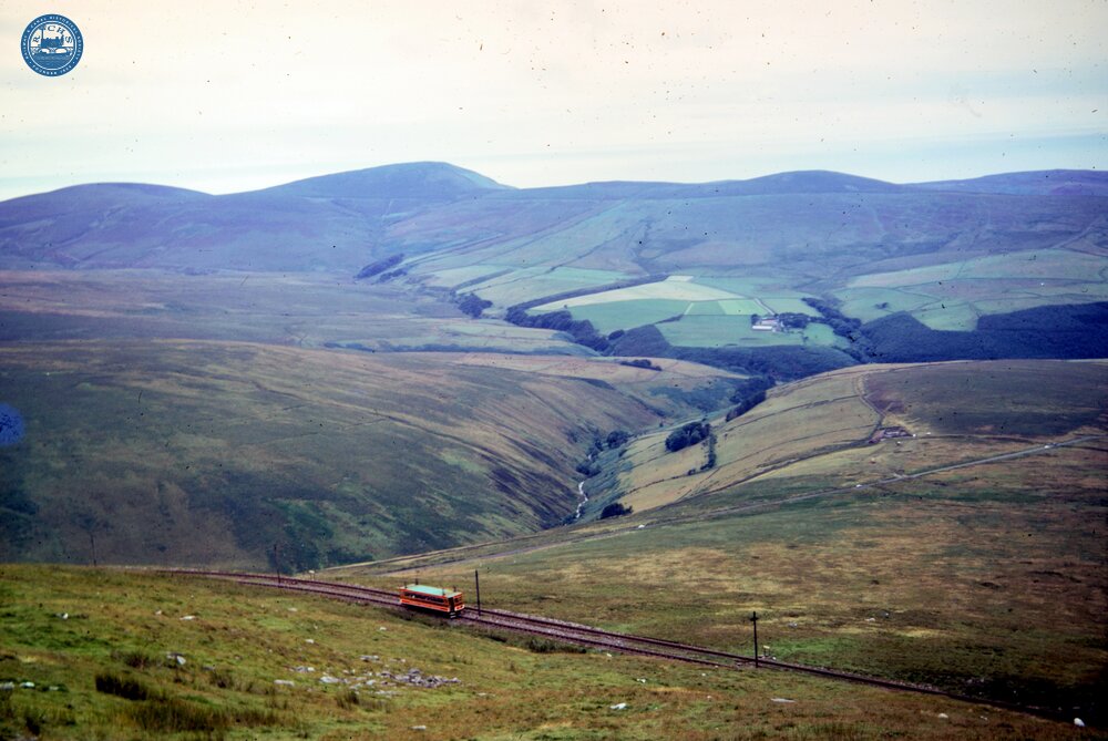 Snaefell Mountain Railway. Looking west from near Snaefell summit. Car No. 5 ascending. 11 August 1971