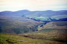 Snaefell Mountain Railway. Looking west from near Snaefell summit. Car No. 5 ascending. 11 August 1971