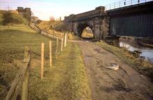 Railways crossing the River Mersey at Heaton Mersey; CLC skew bridge & abutments of Midland Railway bridge