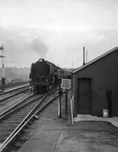 Class 9F 92245 on 09.25 Bournemouth West to Liverpool and Manchester, Blandford Forum, 8th Sep 1962 BJT 52m 24c