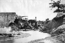 Llandulas Viaduct.(CNH3 @ 215m 73ch) The viaduct was washed away in a storm on 21 August 1879. This image shows the early stage of its reconstruction. (Ref: 031262)