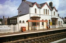 Llanfairpwll (CNH3 @ 242m 29ch). Main station buildings. 23 July 1989