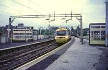 Cheadle Hulme Station (CMP1 @ 180m 57ch), platforms 4 & 3. 07 August 1985