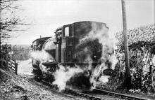J94 Saddle Tank, BR No. 68030, rounding the very sharp curve on the Longcliffe side of Minninglow Sidings, having just crossed Mouldridge Lane. (CHP1 @ 14m 5ch)