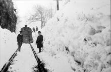 Locomotive and staff in snow at Manystones Cutting. (CHP1 @ 17m 58ch)