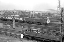 012071  Rugby (LEC1 @ approx 82m 50ch). Class 86 no. 86220 heading London-bound passenger train into station. 8 August 1975 (Ref: 012071)