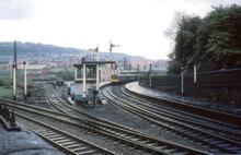 Shipley Station (South to West curve platform. BIB @ 0m 08ch), and Bingley Junction Signal Box (TJC3 @ 205m 75ch), from Stead Street. 11 May 1968