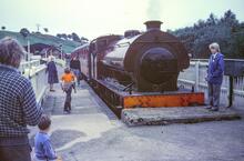 Cheddleton station (CVL @ 16m 43ch).  0-6-0 ST “Josiah Wedgwood” + train. 03 August 1986
