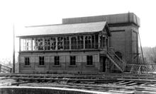 Chesterfield Market Place (CLN1 @ 0m 00ch). Signal box and water tower. 10 April 1956 
