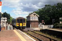 Kiveton Park Level Crossing (MAC3 @ 51m 50ch). Class 153 "Sprinter" No 153351 departing eastbound from the station.