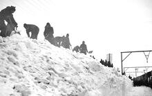 East of Hadfield (HAJ @ c.15m). Snow being cleared from the lineside by soldiers. 1940s (Ref: 031244)