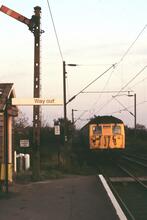 Class 308 EMU No 308136 on the 17.06 Thorpe-le-Soken - Walton leaving Kirby Cross (TWN @ 67m 52ch). 24 October 1987 (Ref: 221532)