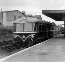 Saffron Walden (AEB @ 43m 43ch), with diesel railbus E79964 in the platform. 24 July 1958