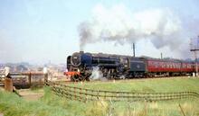 Britannia Pacific 70039 “Sir Christopher Wren” heading a passenger train out of Louth (ELR @ 141m 00ch)