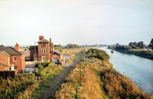 Woodhall Junction station (LNL2 @ 122m 65ch) alongside the River Witham. 22 September 1980