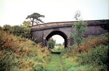 South of Horncastle. Martin Bridge (B1191 road) over former railway (WJH @ approx 128mp). 23 September 1980