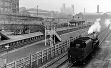 Springburn station (SGN @ 0m 42ch), and North British Locomotive Company’s Atlas Works, looking south-east. September 1965. 