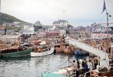 Mallaig Harbour. The foreground boat is “Loch Arkaig”, from Eigg and other islands. 04 July 1964