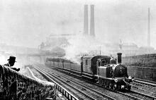 R Class 4-4-0T No.19 ascending Cowlairs Incline with a local train. (Ref: 010945)