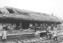 Middlesbrough Station (DSN2 @ 15m 0ch) Bomb damage to Parcels Office Up Side after raid of 3 August 1942. (Ref: 030732)