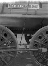 012147   Stockton & Darlington Railway “Locomotion” replica locomotive. Shildon Rail 150, Nameplate and wheels. 26 August 1975