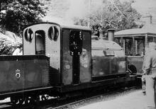 Ffestiniog Railway. Porthmadog (RFF @ 0m 00ch). 0-4-0 loco Prince on train