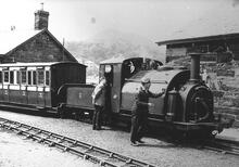 Ffestiniog Railway. Porthmadog, (RFF @ 0m 00ch). 0-4-0 loco Prince on train